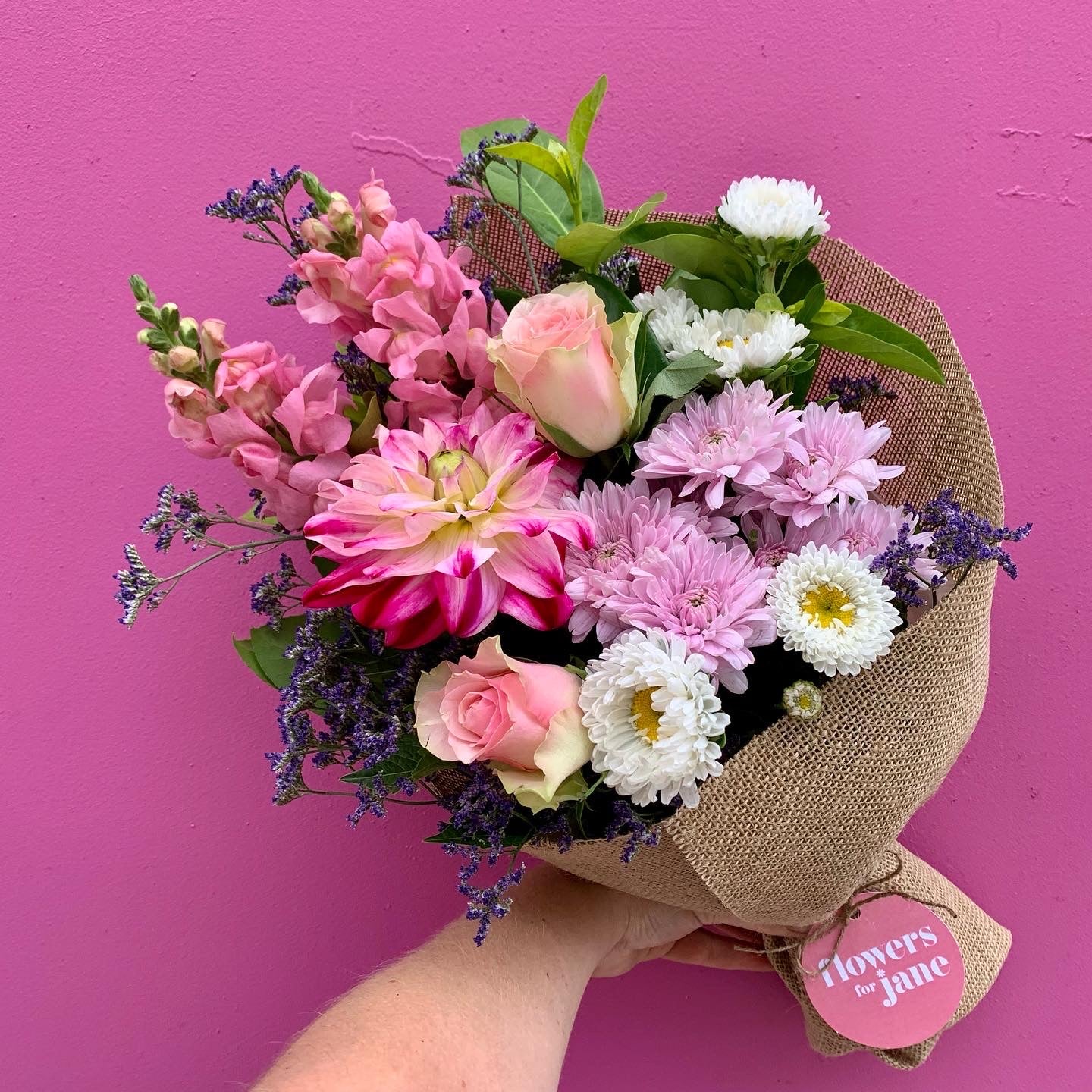 
                  
                    Hessian Wrapped bunch of Flowers
                  
                